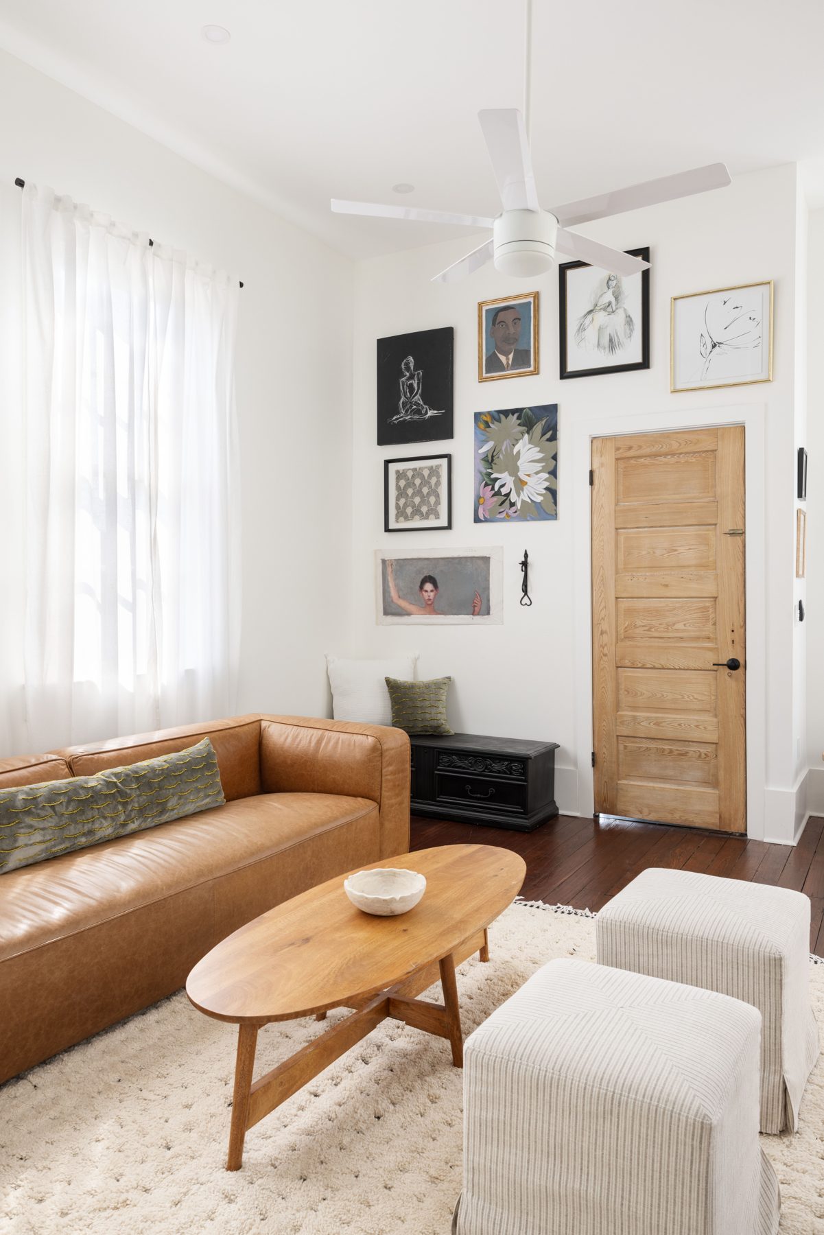 Carondelet living room seating and gallery wall